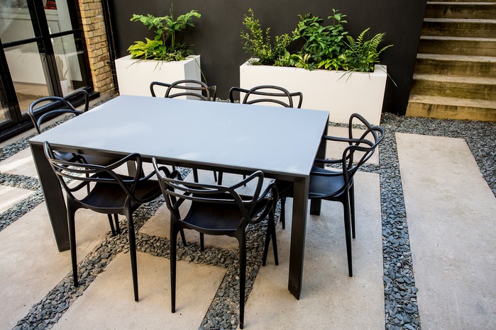 Long paving stones placed horizontally across the patio Long paving stones placed horizontally across the patio